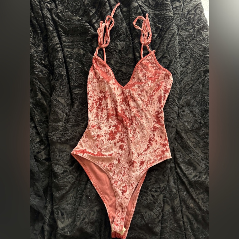 Pink bodysuit